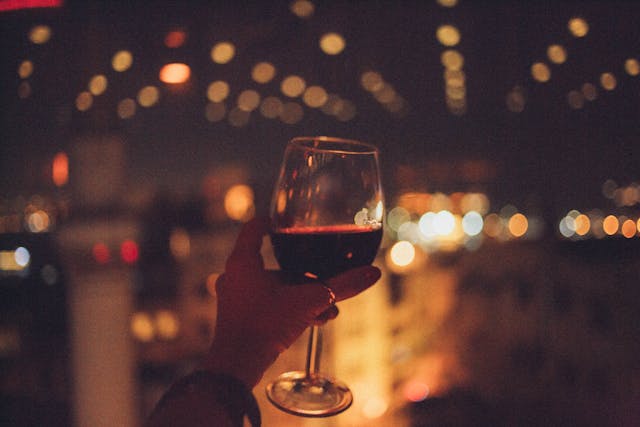 Glass of wine being held while on a boat Use a Magnetic Wine Glass Holder