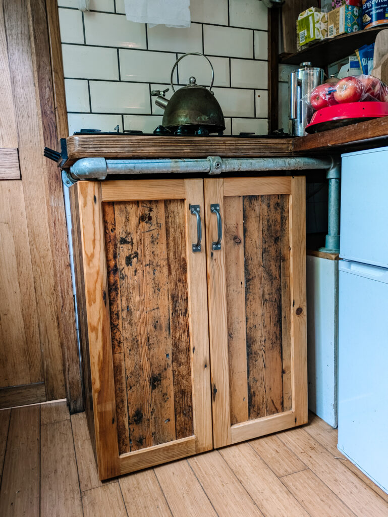 What Wood Pine Cluett Carpentry What Wood Pine doors on a cupboard in a kitchen