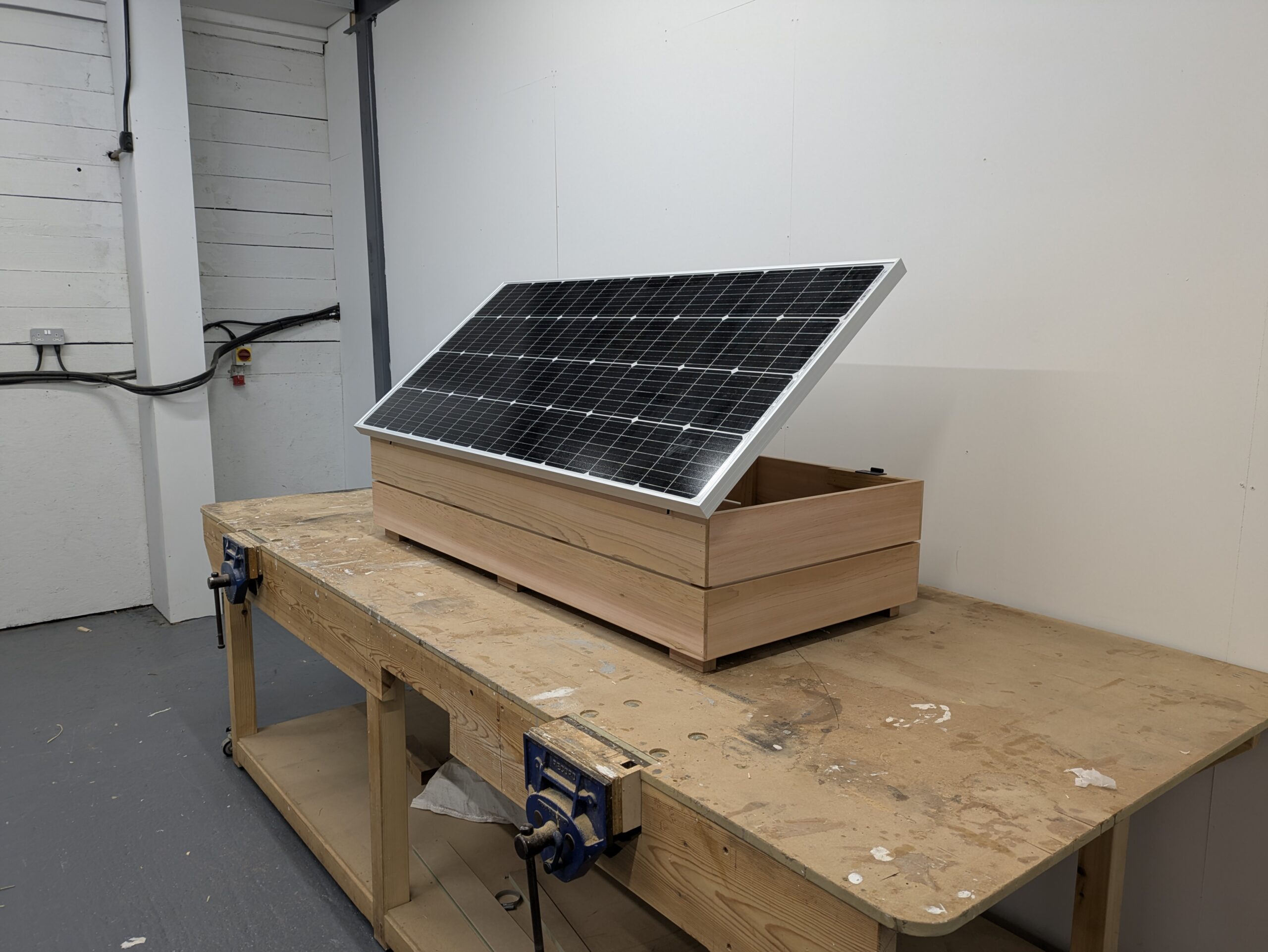 What Wood - Cedar solar box made from cedar, front side view